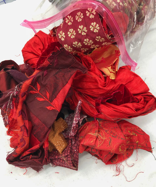 Fabric Scraps, but they're **FANCY** - reds and oranges